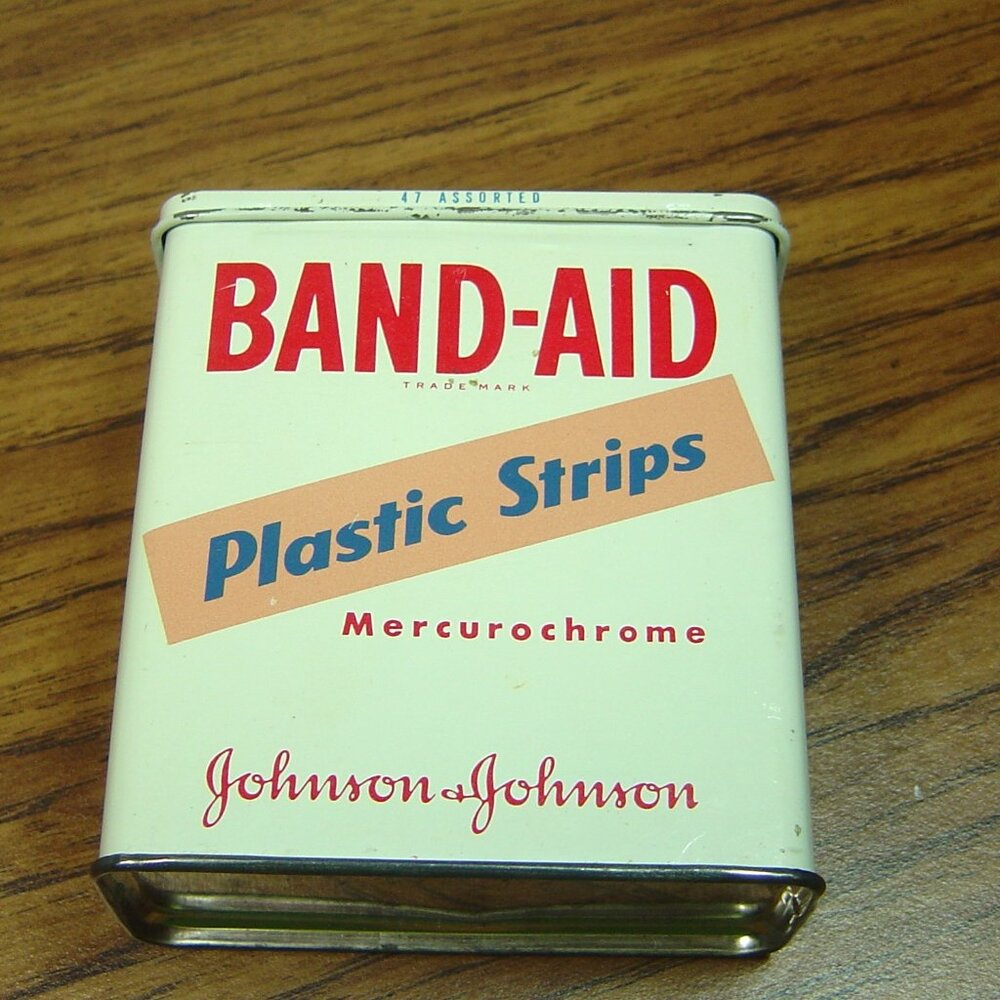 Vintage Johnson & Johnson Band-Aid tin with hinged lid